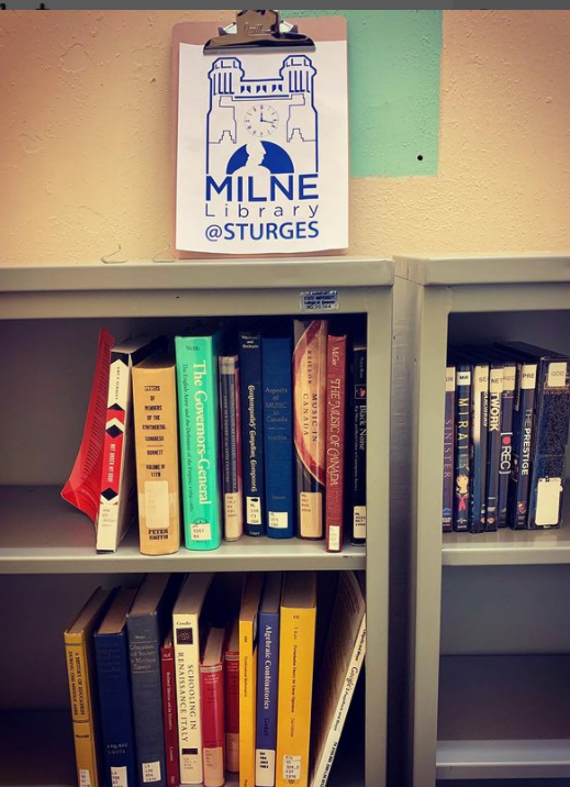 Milne at Sturges sign and Course Reserve materials