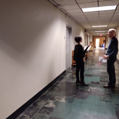 Discussing signage options for the Sturges hallway touring Sturges Hall space January 2020