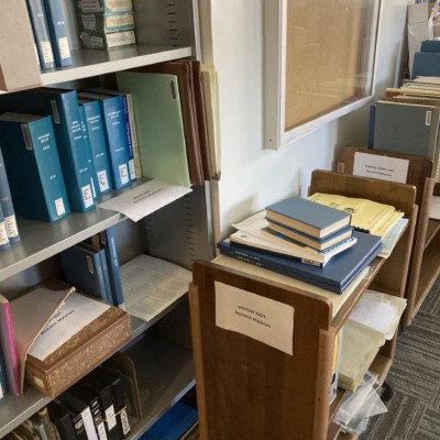 Research Archives on book truck awaiting sorting and shelving Research Archives on book truck awaiting sorting and shelving