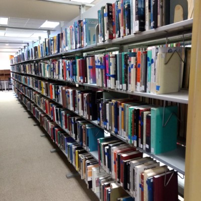 Some of the thousands of books flagged for retrieval from the Milne Library Building, Summer 2020 Some of the thousands of books flagged for retrieval from the Milne Library Building, Summer 2020