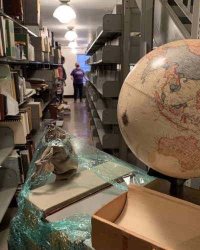 Globe and other Collection objects awaiting placement in Fraser Hall Library, spring 2021 Special Collections items required extra care in transport and storing. Globe and other Special Collection objects awaiting placement in Fraser Hall Library, spring 2021