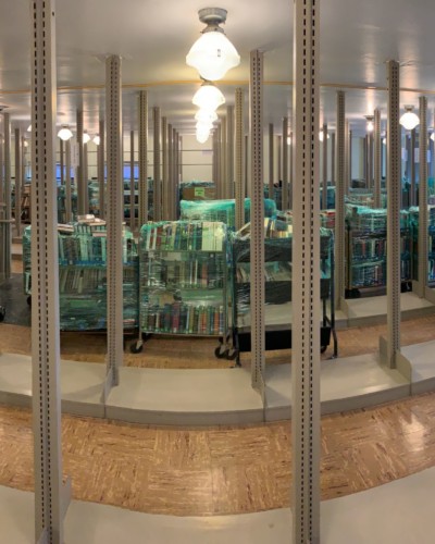 Wrapped Books and items in Fraser 210, awaiting unpacking, sorting, and shelving, Spring 2021 Wrapped Books and items in Fraser 210, awaiting unpacking, sorting, and shelving, Spring 2021