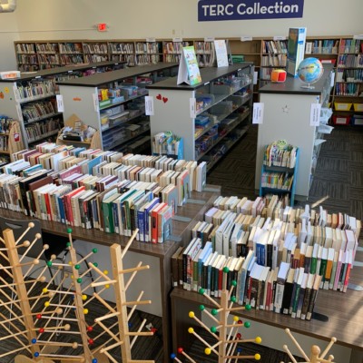 TERC books and manipulatives awaiting sorting and shelving, spring 2021 TERC books and manipulatives awaiting sorting and shelving