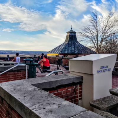 Book drop moved to outside of Sturges hall. Students are outside enjoying a warm winter day.